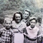 Nola Baisden and son Paul, and neighbors Melvin and Velma Whites Addition, Logan County, WV.