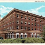The Aracoma Hotel was built in 1917. This postcard was postmarked in Logan on Nov. 23, 1937. The card was published by the Guyan Drug Company. Note the top of the old cars behind the hedges on Main Street. The photo for the card was taken from the area of the Judge Wilkinson home which later became the Harris Funeral Home and is currently the Honaker Funeral Home. Image 147. Aracoma Hotel postcard circa 1930, Logan, WV,