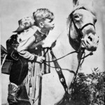 Radio cowboy star Bobby Benson appearing for 1952 Logan Centennial Celebration. Source: Page 42 of the Logan Centennial Celebration Booklet. The B-Bar-B Riders was a popular radio program that ran from 1949 to 1955. Bobby and his friends Tex, Windy, and Irish face modern-day rustlers and other challenges of life on the ranch. Bobby Benson, 1952, Logan, WV