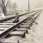 Earl and Bob Lawson playing on R.R. Tracks. YMCA in background. Courtesy of G. B. Berry. Earl and Bob Lawson, Monaville, WV
