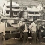Johnson´
s Store in Mallory - circa late 1940s or 1950s. This was located directly across the creek from the old Mallory Grade School. The building on the right was later Doug Porter's Barber Shop. Courtesy of Paula Solar. If you can name any of them, please <a href="https://loganwv.us/man-wv/#respond">leave a comment</a> . Image Ref. 4681. Photo of men in front of the Johnson's Store at Mallory, Logan County, WV c. 1950s.