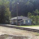 Photo courtesy of Michael Taylor. He writes. The old Monaville Post Office and barber shop. The newer post office was dedicated in the mid 1960s and is now closed also! The old barber shop was operated by the late Arnold Frye, and it has been operated in recent times by Randy Cox. Old Monaville Post Office and Barber Shop