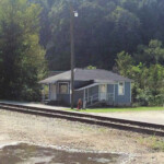 Photo courtesy of Michael Taylor. He writes. The old Monaville Post Office and barber shop. The newer post office was dedicated in the mid 1960s and is now closed also! The old barber shop was operated by the late Arnold Frye, and it has been operated in recent times by Randy Cox. Old Monaville Post Office and Barber Shop
