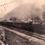 1937 Henlawson, WV courtesy of Jay Anna Ellis. 1937 photo of a passenger train passing through Henlawson, WV.