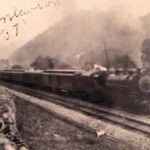 1937 Henlawson, WV courtesy of Jay Anna Ellis. 1937 photo of a passenger train passing through Henlawson, WV.