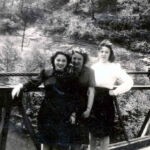 Photo courtesy of John Paul Curry. Best friends standing on the old Henlawson Bridge. L-R is Hilma Hale, Doris Brumfield (1926-2015) and Amelia Cunningham Petroff (1927-2013). The photo was taken when they were in their late teens. Henlawson, WV