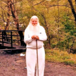 Corb Jeffrey, Henlawson, WV standing at the RR Bridge that crosses over the river to Merrill Park. Courtesy of William Erlewine. 991364 Corb Jeffrey, Henlawson, WV