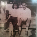 Photo courtesy of Leah Jane Ferguson Luptak. Mom and Dad, Patsy Hobbs and Ernest Elmo Ferguson, sitting on Granny and Papaw's (Viola znd Charles Ferguson) back porch at Peach Creek, probably in the fall of 1948, notice the wringer washer, the bushel basket of apples, their dog, Puppy standing in the screen door( they still had Puppy when I was born) and Granny's shadow taking the picture. I love moms outfit she saved her money from working at the lunch counter in GC Murphy's to buy the whit blouse at Mannings Department Store and Granny made the skirt for her, it was bright red with white eyelet lace. Any time she could save money and buy something not from the company store was a source of great pride and accomplishment! Patsy Hobbs Ferguson and Ernest Elmo Ferguson, Peach Creek, WV
