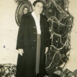 Unknown lady – note her portrait on the wall. This was a common practice of keeping track of someone as they aged.
<br />
<cite>Courtesy of Pam Brennan</cite>. If you can ID this person, please leave a <a href="https://loganwv.us/unknown-faces/#respond">comment</a>. Image 3507. Appalachia Christmas