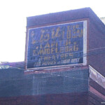 "Visit The Logan Capitol & Midelburg Theatres For Movies At Their Best." Taken June 12, 2000. Logan Theater Advertisement