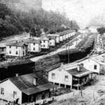 Early days of Dehue. The houses on the left are the Bosses Row. <br />Courtesy of Dolores Riggs Davis - <a href="https://loganwv.us/the-end-of-an-era/">Read The End of an Era</a> Dehue, WV