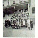Student Body and Teachers at Accoville<br />1922 Man High School Yearbook. 1922-man-high-school-p72b
