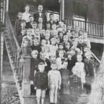 Photo courtesy of Lynn Skaggs Davis. Circa 1926, 1st Grade Class, Ethel School. Standing at the top is the teacher, Miss Clay and the Principal, R.H. Carder (my grandfather). 1926 Ethel Grade School, Logan County, WV