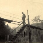 Whites Addition about 1955, George Thompson coming home from the Mt. Gay Coal Mine. The big willow tree was in the yard of the Clifton Black family at Cherry Tree. 1955, George Thompson, Whites Addition, Logan County, WV. Gay Coal Mine.