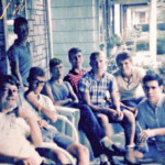 1966 some of the “porch sitters” that frequented the No. 16 company store at Verdunville. From the left are Danny Vance, Ralph Evans, Tommy Hall, Pat Maynard, Jerry McCallister, and Terry McCallister. Kneeling is Teddy Hale and standing is Gary Evans. Taken at Teddy's house. Tommy, Jerry, Terry, and Gary are no longer with us. Courtesy of Dwight Williams. Image 5891. 1966 Porch Sitters Verdunville, Logan County, WV