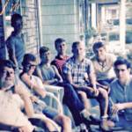 1966 some of the “porch sitters” that frequented the No. 16 company store at Verdunville. From the left are Danny Vance, Ralph Evans, Tommy Hall, Pat Maynard, Jerry McCallister, and Terry McCallister. Kneeling is Teddy Hale and standing is Gary Evans. Taken at Teddy's house. Tommy, Jerry, Terry, and Gary are no longer with us. Courtesy of Dwight Williams. Image 5891. 1966 Porch Sitters Verdunville, Logan County, WV