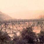 1976 Pecks Mill Bridge courtesy of Bob Piros. The bridge was built in 1927 and replaced in ?? The new bridge is named in honor of PFC Homer Douglas Nelson killed in Vietnam Oct. 28, 1965. 1976 Pecks Mill Bridge, Logan County, WV