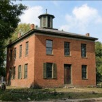 ChatGPT colorized image of the Logan Courthouse built in the 1870s and torn down in 1905. 1870s Logan Courthouse colorized