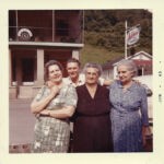 Margaret Hinkle, Eva Hardy, Emma Morgan and Ronald McCormack taken at the funeral of Virginia Taylor McCormack. Oscar Sansom's Ashland Oil Station is in the background. Chery Tree, WV