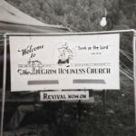 Tent revival meeting on vacant lot next to lot that would become the Pilgrim Holiness Church Tent revival meeting on vacant lot next to lot that would become the Pilgrim Holiness Church