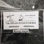 Tent revival meeting on vacant lot next to lot that would become the Pilgrim Holiness Church Tent revival meeting on vacant lot next to lot that would become the Pilgrim Holiness Church