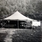 Tent revival meeting on vacant lot next to lot that would become the Pilgrim Holiness Church Tent revival meeting on vacant lot next to lot that would become the Pilgrim Holiness Church