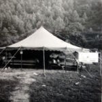 Tent revival meeting on vacant lot next to lot that would become the Pilgrim Holiness Church Tent revival meeting on vacant lot next to lot that would become the Pilgrim Holiness Church
