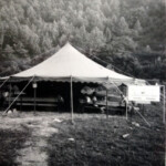 Tent revival meeting on vacant lot next to lot that would become the Pilgrim Holiness Church Tent revival meeting on vacant lot next to lot that would become the Pilgrim Holiness Church