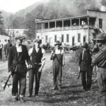 Photo showing the miners giving up their guns at Blair after the Battle of Blair Mt. This is where the Blair Baptist Church sits now. Photo courtesy of Kenny King via Emmett Ray Adkins. Battle of Blair Mountain