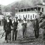 Photo showing the miners giving up their guns at Blair after the Battle of Blair Mt. This is where the Blair Baptist Church sits now. Photo courtesy of Kenny King via Emmett Ray Adkins. Battle of Blair Mountain