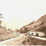 Bottom right is the Cherry Tree School. Up the tracks is Monitor. Whites Addition is on the other side of Island Creek which is behind the school and houses. "Taken about 1945 when there was still an open corn field beside the school. The cornfield was a favorite place for the boys to play football and for two summers a tent roller skating rink occupied the field as well as a couple of tent revival meetings." Courtesy of Robert E. McCormack. Cherry Tree School about 1945