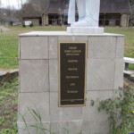 Chief Logan statue plaque