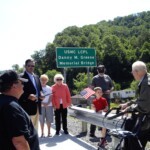 Andy Clark, Dana Greene, Delegate Rupert “Rupie” Phillips Jr., Rosalee Gore and mother, Cuba Gore, Richard Todd, Nathan (Danny's six year old grandson), and Thurmon Dillow. danny-m-greene-bridge-17