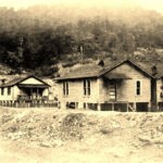 Cherry Tree view from Fisher Bottom courtesy of Cora Sloan Harrison. Fisher Bottom was located between the two bridges at Cherry Tree and Mt. Gay where the Mt. Gay Blvd. Bridge is today. It was all torn down when the boulevard was built in 1956. Cherry Tree view from Fisher Bottom