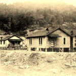 Cherry Tree view from Fisher Bottom courtesy of Cora Sloan Harrison. Fisher Bottom was located between the two bridges at Cherry Tree and Mt. Gay where the Mt. Gay Blvd. Bridge is today. It was all torn down when the boulevard was built in 1956. Cherry Tree view from Fisher Bottom