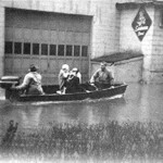 Flood 1957 - Rev Hattie Hickman & Emma Jean being rescued. Sunbeam Bakery in background Flood 1957 - Rev Hattie Hickman & Emma Jean being rescued. Sunbeam Bakery in background