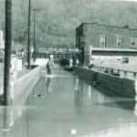 Flooding at Monitor Junction at Mt. Gay. In the 1940s, the intersection across the bridge was called Monitor Junction. This side of the bridge was called Fisher Bottom and Cherry Tree Bottom was across the bridge before this one. Monitor Junction, Logan County, WV