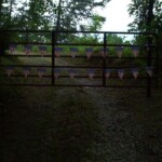 Gate to the Scaggs Cemetery located at the mouth of Caney Branch near Chapmanville. gate-to-scaggs-cemetery-located-at-the-mouth-of-caney-branch-near-chapmanville
