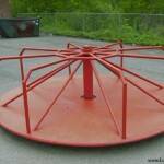 This merry-go-round was in service at the Justice Grade School for about fifty years. This picture was taken in 1999 and the merry-go-round was removed a year or so later. Merry-Go-Round