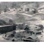 1920s Mud Fork, Camp #16. Photo courtesy of Shirley Bentley Nelson taken by her dad, M.F. Bentley. "My family lived on the hill in the 2nd house from left." 1920s Mud Fork