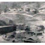 1920s Mud Fork, Camp #16. Photo courtesy of Shirley Bentley Nelson taken by her dad, M.F. Bentley. "My family lived on the hill in the 2nd house from left." 1920s Mud Fork