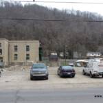 The empty lot where Logan High School and later the East Jr. High School stood. On the left is the old Logan Grade School. Photo taken 3-25-2014. Old LHS Empty Lot, Logan, WV