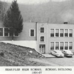 Old Sharples High School (1924-1993) on the hill. <br />Courtesy of Emmett Ray Adkins. Old Sharples High School