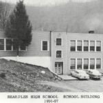 Old Sharples High School (1924-1993) on the hill. <br />Courtesy of Emmett Ray Adkins. Old Sharples High School