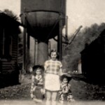 Two Little Cowgirls by the Water Tank at Slagle, WV. Contest Entry #21 21 - Two Little Cowgirls at Slagle, WV