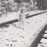 The author, Donna Jean Rittenhouse recalls her years in her grandparents ' house by the railroad tracks as a bittersweet period. She is shown here in December 1935. Donna Jean Rittenhouse in December 1935, Henlawson, WV
