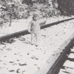 The author, Donna Jean Rittenhouse recalls her years in her grandparents ' house by the railroad tracks as a bittersweet period. She is shown here in December 1935. Donna Jean Rittenhouse in December 1935, Henlawson, WV