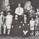 1925 portrait shows the family well established in Logan County, Alex sits at left, with Anna, Elizabeth, sister-in-law Anna, and daughters Virginia and Elizabeth also in the front row; sons Peter, Paul, brother Peter and Julia stand at rear. The Zekany Family in 1925, Henlawson, WV