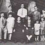 1925 portrait shows the family well established in Logan County, Alex sits at left, with Anna, Elizabeth, sister-in-law Anna, and daughters Virginia and Elizabeth also in the front row; sons Peter, Paul, brother Peter and Julia stand at rear. The Zekany Family in 1925, Henlawson, WV
