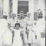 Elizabeth (nee Barath) Augustine, Robert Barath, Helen (nee Haydu) Barath, and the little girl is Audrey Augustine, about 1950 in Logan, WV..